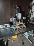 Hot-printing machine for applying hot-melt adhesive to plastic parts - 2
